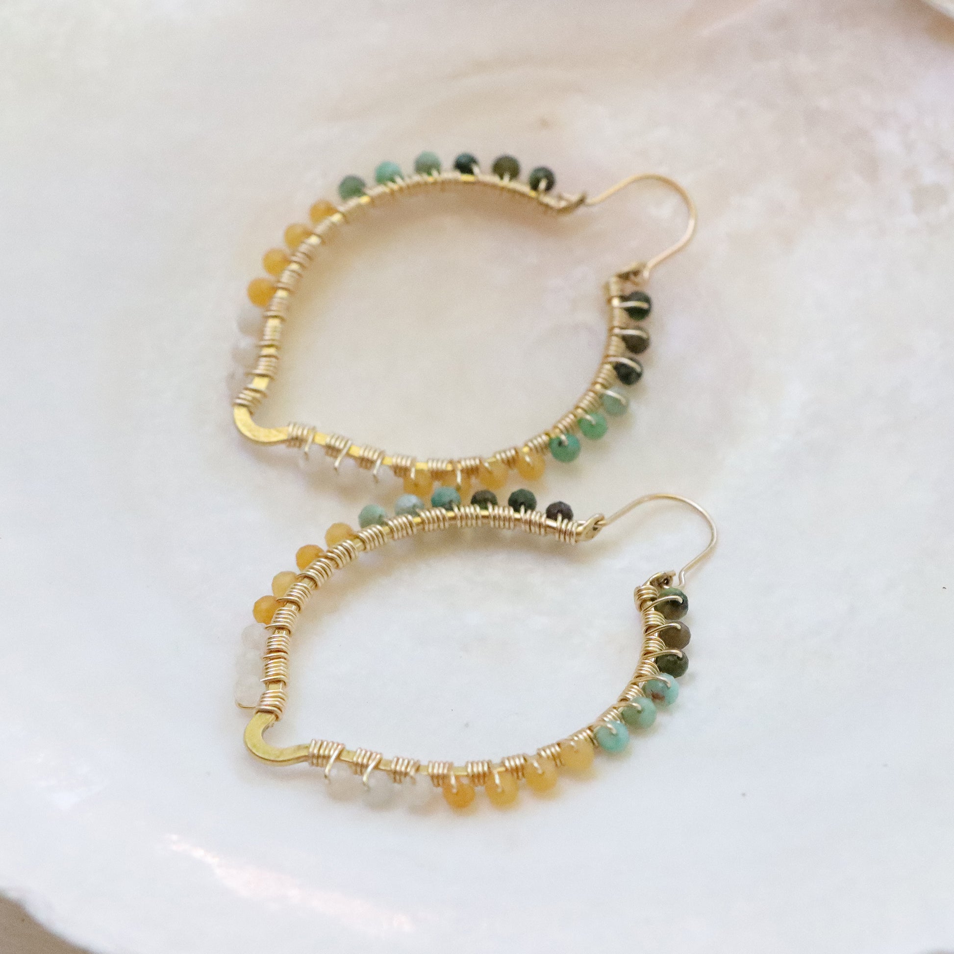 Large Oval Point with Gemstones in Gold