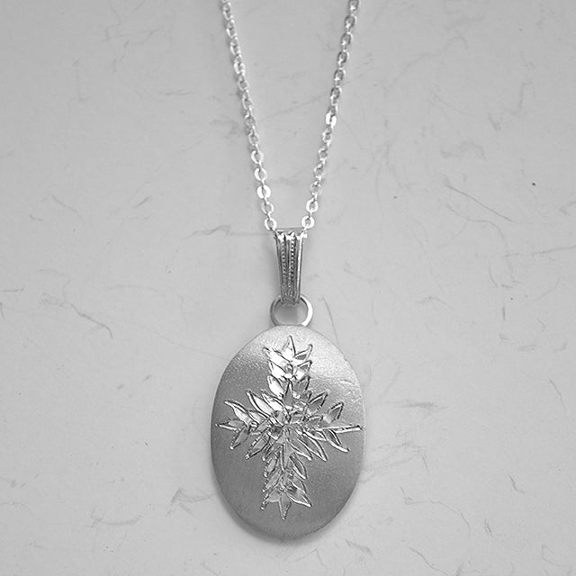 January Flower of the Month Oval Pewter Pendant