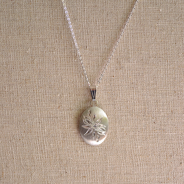 December Flower of the Month Oval Pewter Pendant
